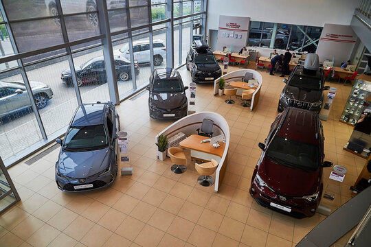 Murmansk, Russia - June 21, 2019: Cars in showroom of dealership Toyota in Murmansk in Russia. Top view