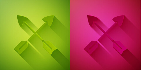 Paper cut Crossed arrows icon isolated on green and pink background. Paper art style. Vector.
