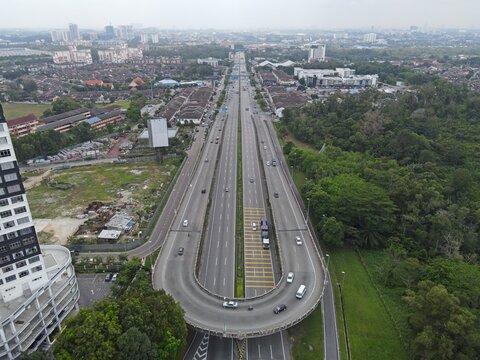 Perling highway overhead u-turn with traffic and aerial view