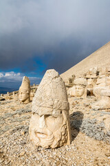Nemrut has giant sculptures and reliefs were built on the monumental tomb made for Antiochus I the King in Turkey,
