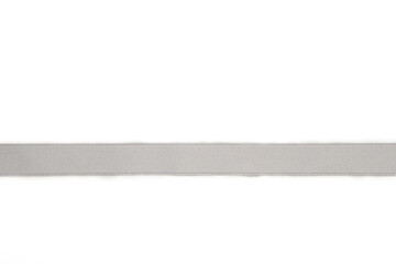 Shiny silver satin ribbon on white background