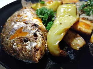 delicious fish and salads on presentation plate