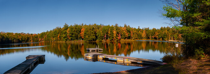 Panoramic of a small lake in Broome County in Upstate NY during an early Autumn Morning