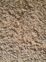 Sandstone wall structure, arbitrary masonry, close-up.