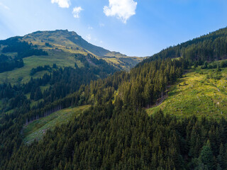 Aerial view into the valley head of the Hinterglemm Mountains on a summer day in the Alps at Saalbach-Hinterglemm, Austria.