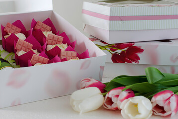 flowers and cupcakes in a box. birthday cupcake
