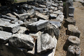 Greece, Athens, July 27 2020 - Columns and pieces of stone at the ancient Agora archaeological site.