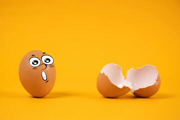 eggs with facial expressions on a yellow background.