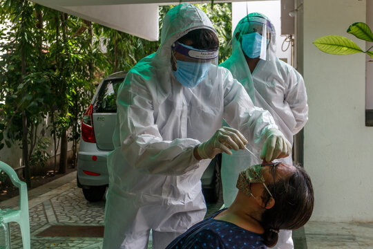 Rapid Antigen Test being performed by Health Workers at Camp in Residential Society