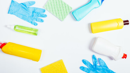 Rubber gloves, sponges and bottles of cleaning fluids