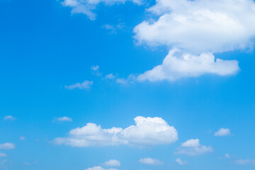 Naklejka na ściany i meble Air clouds in the blue sky background