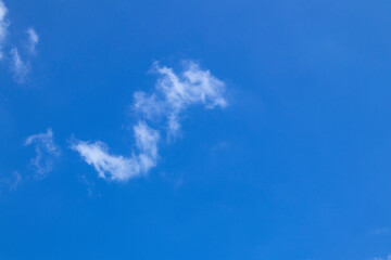 Air clouds in the blue sky background