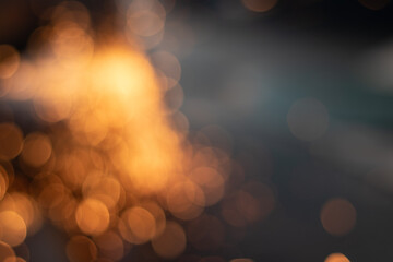 Gold abstract bokeh background, Festive xmas abstract background with bokeh defocused lights and stars
