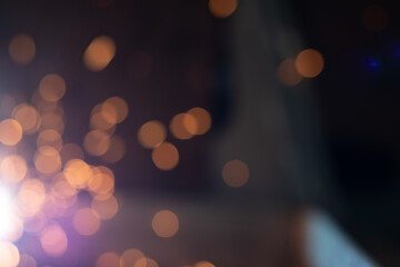 Gold abstract bokeh background, Festive xmas abstract background with bokeh defocused lights and stars
