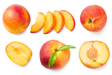 peach fruits with green leaf and slices isolated on white background. top view