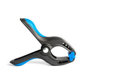 Black and blue plastic clamps isolated white background