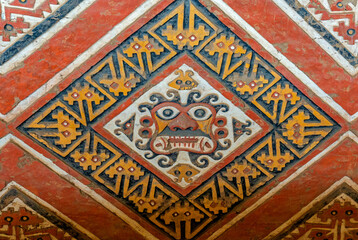Bas relief of the Moche God Ai Apaec inside a tomb of the Huaca de la Luna near Trujillo, Peru. Ai Apaec is the creator god, protector of the Moche or Mochica civilization.
