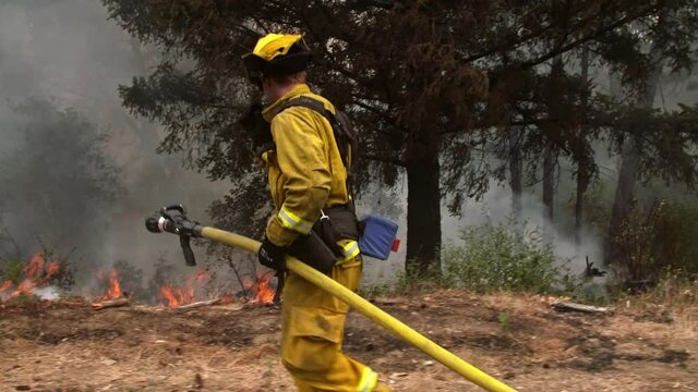 Boulder Creek, California, USA. 23 August 2020. Fireman fighting a wildfire. California, USA. The CZU Lightning Complex Fire that ravaged the Santa Cruz mountains.