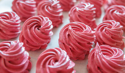 Handmade pink marshmallows on parchment background. Homemade Sweets dessert