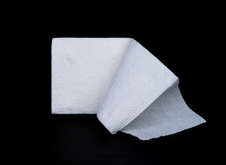 Crumpled tissue paper isolated on black background texture