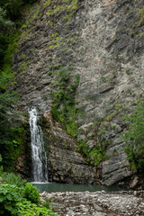 High mountain with a waterfall.Mountain landscape in summer