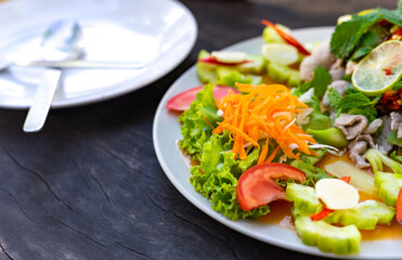 Pork with Lemon spicy sweet sauce thai food.