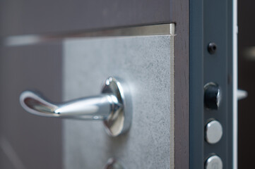 Handle details entrance door finished with wood veneer aтв stone blue steel color	