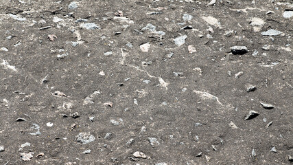 Concrete, weathered, worn with cracks and scratches. Landscape style. Rough Concrete Surface. Great background or texture. Monochrome old concrete wall background