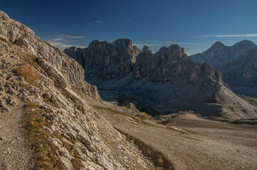 Early morning mountain panorama as seen from Refugio Lagazuoi at the start of Alta Via 1 stage #3, Monte Lagazuoi, Cortina d'Ampezzo, province of Belluno, Dolomites, South Tyrol, Italy.