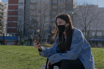 Social media concept, woman with mobile smartphone. covid 19