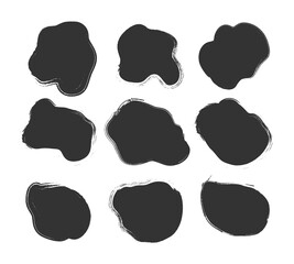 Brushes ink splatters.