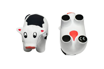 Isolated artificial toy cow with clipping path on white background