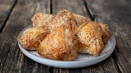 Assortment of burekas with cheese and mushrooms
