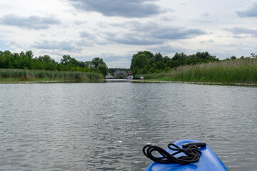 view of the Wesenberg marina on Lake Woblitz with a kayak in the foreground