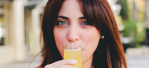 girl having a mimosa in south beach Lincoln road 