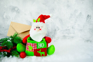 Christmas, new year composition. Santa claus, fir branches, snow on wooden white background. Flat lay, top view. copy space. Concept for New Year, Winter Holidays