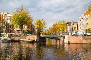 Fototapeta na wymiar Bridges and buildings in the Grachten of Amsterdam, Netherland