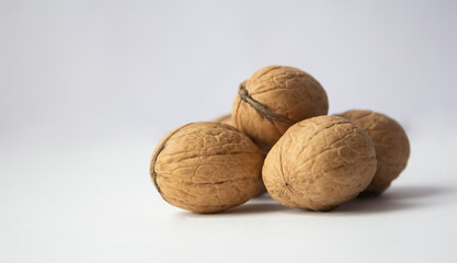 Walnuts on a white background close up