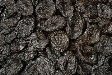 Dried prunes as a spectacular black background from natural products.
