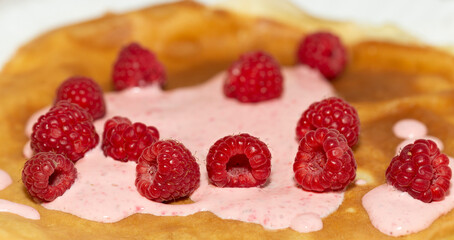 Pancakes with cream and raspberries. Vitamin Dessert.