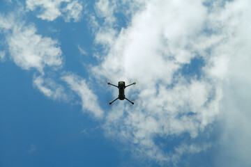 Fototapeta premium Quadrocopter on a background of blue sky.