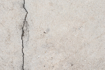 Blank concrete gray rough wall for background with copy space for text. Beautiful grey wall with cracks and dirty.
