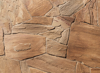 Obraz na płótnie Canvas Natural stone texture background, rough cracked surface.