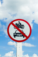 no car and motor bicycle entry sign with blue sky and cloud