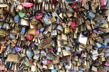 Fence of love locks on Pont des Artes, Paris.