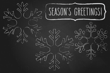 Chalk snowflakes and Season's greetings