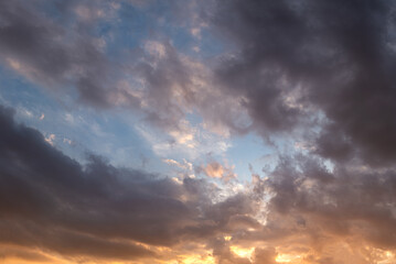 abstract background of cloudy sunset sky golden hour