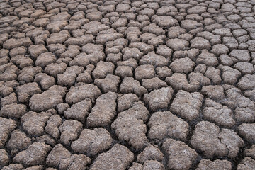 dry bottom of the reservoir. soil erosion. the water's gone. the bottom of the lake. a desert...
