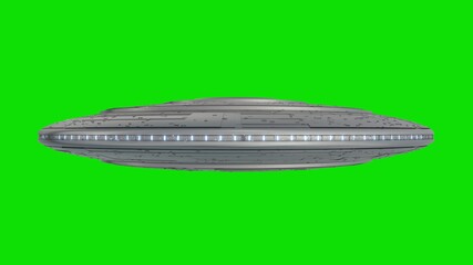 UFO - Flying Saucer with Blue lights isolated on green screen background. 3d rendering © Laricha