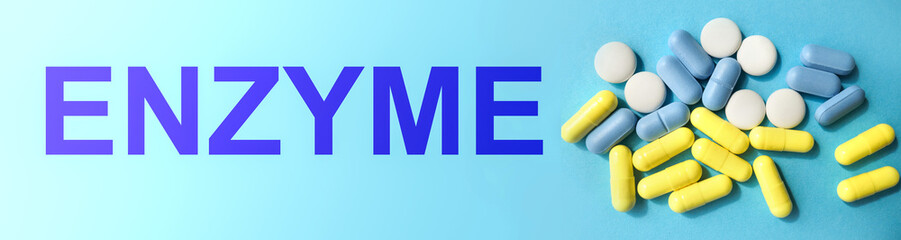 ENZYME. The concept of medicine. on a blue background pills yellow, white, blue. banner